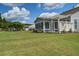 Spacious backyard with a well-maintained lawn, patio, and pergola at 129 Schooner Bend Ave, Summerville, SC 29486