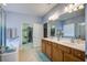 Bright bathroom boasts double vanity, soaking tub and large walk-in closet at 129 Schooner Bend Ave, Summerville, SC 29486