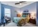 Comfortable bedroom with great natural light and calming blue paint at 129 Schooner Bend Ave, Summerville, SC 29486