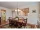 This dining room features a view into a hallway and open sight lines into other rooms at 129 Schooner Bend Ave, Summerville, SC 29486