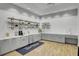 Well-equipped kitchen area with ample counter space, stainless steel appliances, and organized shelving, ready for meal preparation at 129 Schooner Bend Ave, Summerville, SC 29486