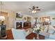 Cozy living room features hardwood floors, a fireplace, TV, and comfortable seating at 129 Schooner Bend Ave, Summerville, SC 29486