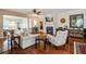 Comfortable living room features hardwood floors, a fireplace, TV, and stylish furnishings at 129 Schooner Bend Ave, Summerville, SC 29486