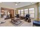 Bright living room featuring a ceiling fan, comfortable seating, and an open floor plan at 129 Schooner Bend Ave, Summerville, SC 29486