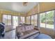 Inviting sunroom offers ample seating and natural light at 129 Schooner Bend Ave, Summerville, SC 29486