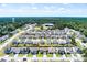 Expansive aerial view highlighting homes with community water tower and neighborhood at 1311 Berry Grove Dr, Summerville, SC 29485