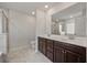 Primary bathroom featuring a double vanity, tile floors, and a glass shower at 1311 Berry Grove Dr, Summerville, SC 29485