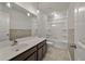 Well-lit bathroom with a double sink vanity, a bathtub, and modern fixtures at 1311 Berry Grove Dr, Summerville, SC 29485
