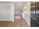 Inviting entryway showcasing wood-look flooring leading into a bright, open living space at 1311 Berry Grove Dr, Summerville, SC 29485