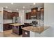 Kitchen featuring dark cabinetry, stainless steel appliances, and a spacious island at 1311 Berry Grove Dr, Summerville, SC 29485