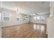 Spacious living area with wood-look flooring, a statement wall, and ample natural light at 1311 Berry Grove Dr, Summerville, SC 29485