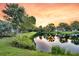Scenic pond view surrounded by lush greenery, offering a peaceful and serene backdrop at 1311 Royal Links Dr, Mount Pleasant, SC 29466