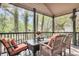 Cozy porch with seating, perfect for outdoor relaxation overlooking lush trees at 1311 Royal Links Dr, Mount Pleasant, SC 29466