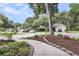 Picturesque street view of well-maintained homes and manicured lawns in a quiet neighborhood at 1311 Royal Links Dr, Mount Pleasant, SC 29466