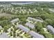 Charming townhome community featuring tree-lined streets, lush greenery, and proximity to scenic marsh views and waterway at 132 Fresh Meadow Ln, Mount Pleasant, SC 29466