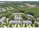 Charming townhome community featuring tree-lined streets, lush greenery, and proximity to scenic marsh views and waterway at 132 Fresh Meadow Ln, Mount Pleasant, SC 29466