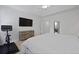 Bright bedroom with television, ceiling fan, and Peloton exercise bike at 132 Fresh Meadow Ln, Mount Pleasant, SC 29466