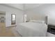 Bright bedroom with an upholstered bed and two entry ways leading to other rooms at 132 Fresh Meadow Ln, Mount Pleasant, SC 29466
