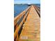Private community dock with wooden railings, providing access to the serene waters at 132 Fresh Meadow Ln, Mount Pleasant, SC 29466