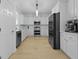 Spacious kitchen with stainless steel appliances and ample white cabinets at 132 Fresh Meadow Ln, Mount Pleasant, SC 29466