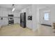 Bright, white kitchen featuring stainless steel appliances and light wood flooring at 132 Fresh Meadow Ln, Mount Pleasant, SC 29466