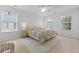 Bright bedroom with natural light, hardwood floors, and neutral decor at 132 Fresh Meadow Ln, Mount Pleasant, SC 29466