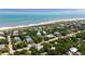 Coastal home with beautiful beach access and lush greenery surrounding the neighborhood at 14 55Th Ave, Isle of Palms, SC 29451