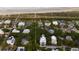 Gorgeous coastal property featuring an inviting exterior and convenient beach access, surrounded by mature trees at 14 55Th Ave, Isle of Palms, SC 29451