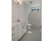 Updated bathroom with tile floors, white subway tile, and a single sink vanity at 14 55Th Ave, Isle of Palms, SC 29451