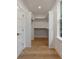 Empty walk-in closet with hardwood floors and plenty of storage space, ready for customization at 14 55Th Ave, Isle of Palms, SC 29451