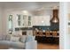 Open kitchen featuring counter seating and stainless steel appliances at 14 55Th Ave, Isle of Palms, SC 29451