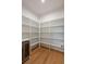 Walk-in pantry with custom shelving at 14 55Th Ave, Isle of Palms, SC 29451