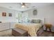 Cozy bedroom with floral bedding, large bed, and bright natural light at 1406 Oaklanding Rd, Mount Pleasant, SC 29464