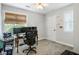 Bright bedroom with a computer desk, ergonomic chair and natural light from a large window at 1406 Oaklanding Rd, Mount Pleasant, SC 29464