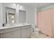Bright bathroom with a double sink, and gray cabinets at 142 Airy Dr, Summerville, SC 29486