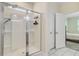 Clean bathroom featuring a glass shower enclosure, white tile, and neutral decor at 142 Airy Dr, Summerville, SC 29486