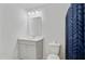 Bathroom featuring a modern vanity with a sink, a toilet, and a shower with a blue patterned curtain at 142 Airy Dr, Summerville, SC 29486