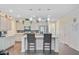 Neutral-toned kitchen with an island, granite countertops, and stainless steel appliances at 142 Airy Dr, Summerville, SC 29486