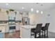 Bright kitchen featuring gray cabinets, granite countertops, stainless appliances, and a center island at 142 Airy Dr, Summerville, SC 29486