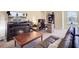 Photo of the living room with a fireplace, TV, furniture, and a window with natural light at 142 Airy Dr, Summerville, SC 29486