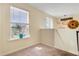 Upstairs loft area, with a large window overlooking the neighborhood at 142 Airy Dr, Summerville, SC 29486