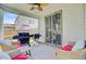 Relax on the patio with comfortable seating and a grill for cooking at 142 Airy Dr, Summerville, SC 29486