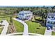Aerial view of a beautiful home with manicured lawns, a long driveway, and lush surroundings at 1491 Tomato Farm Cir, Mount Pleasant, SC 29464