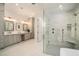 Luxurious bathroom with a glass-enclosed shower, double vanity, and elegant fixtures at 1491 Tomato Farm Cir, Mount Pleasant, SC 29464