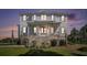 Charming two-story home featuring a welcoming front porch and classic architectural details at 1491 Tomato Farm Cir, Mount Pleasant, SC 29464