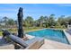 Sparkling pool with lounge chairs, perfect for relaxing and enjoying the outdoors at 1491 Tomato Farm Cir, Mount Pleasant, SC 29464