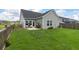 Expansive, well-maintained backyard with a cozy patio area for outdoor seating and relaxation at 160 Greenbelt Ct, Summerville, SC 29485