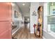 Inviting entryway featuring hardwood floors, a decorative console table, and a charming hall tree at 160 Greenbelt Ct, Summerville, SC 29485