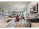 Bright kitchen showcasing stainless steel appliances, a modern sink, and a view into the open-concept living space at 160 Greenbelt Ct, Summerville, SC 29485