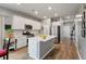 Modern kitchen with white cabinets, quartz countertops, stainless steel appliances, and a central island at 160 Greenbelt Ct, Summerville, SC 29485